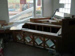 Interior renovation in progress with exposed structures.