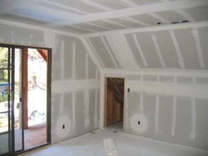 Interior room under drywall installation process.