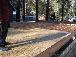 Wooden residential deck construction in progress