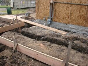Foundation trenches at construction site.