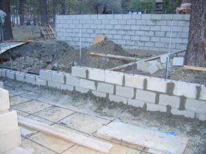 Cinder block wall construction in progress.