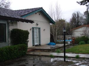 Rainy day at a cozy suburban home.