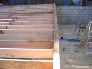 Wooden floor joists in construction site.