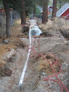Residential drainage system installation in progress.