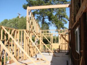 Wooden house frame construction site